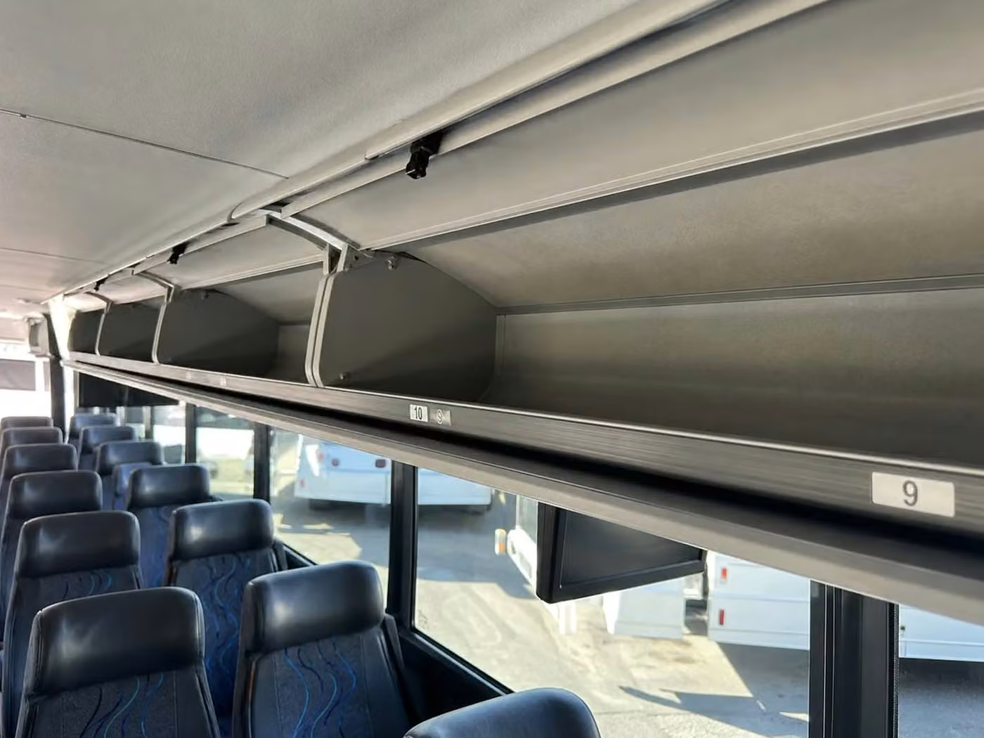 south bend 25 passenger minibus overhead storage