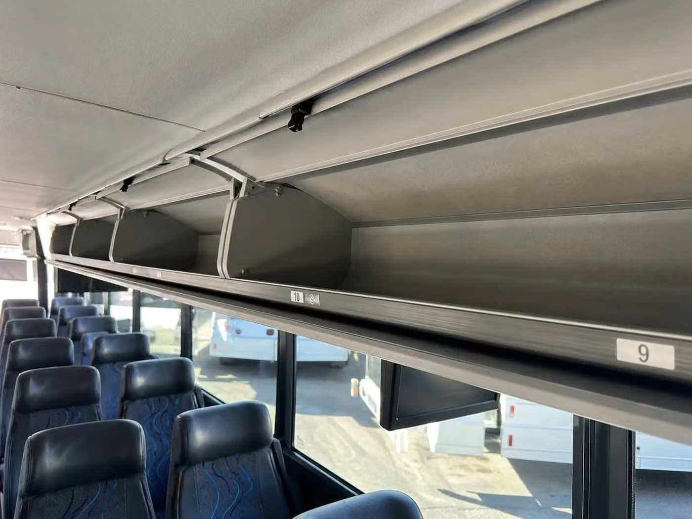 south bend charter bus overhead storage